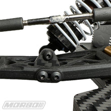 Load image into Gallery viewer, B6 FRONT ARM SHOCK RISERS CF
